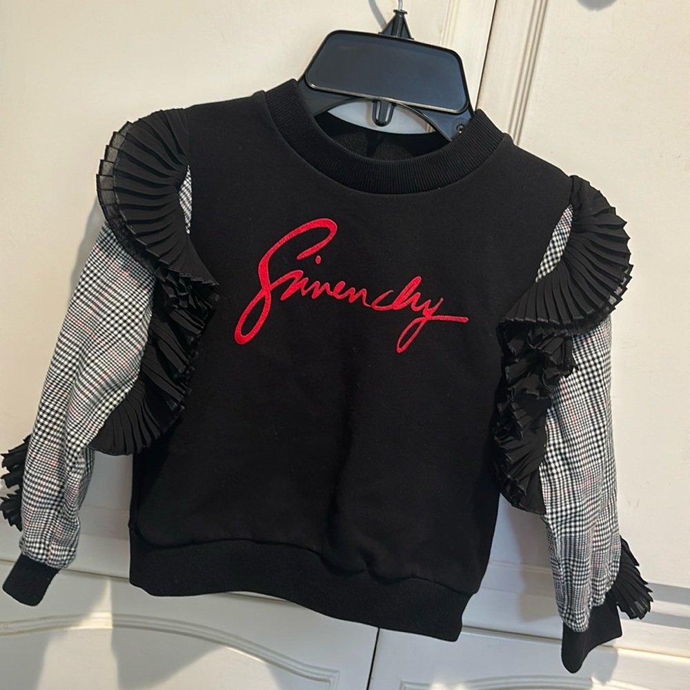 Givanchy sweater size 4 kids black with raffles on sleeves and logo in front